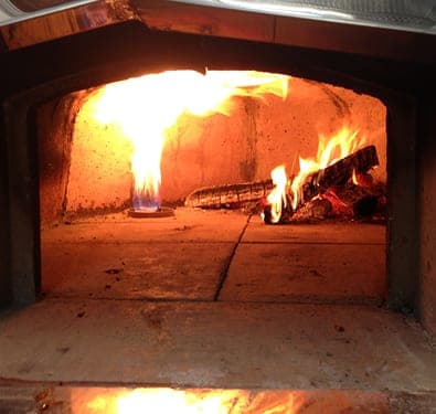 Wood fired pizza in progress